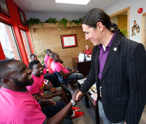 WAYNE GLOWACKI / WINNIPEG FREE PRESS

At right, Wpg. Centre MP Robert Falcon Ouellette met with members of the Ghana Pavilion including Saalu Osman at left, the group delivered their petition to Robert in his constituency office Tuesday.   Carol Sanders story  August 29 2017