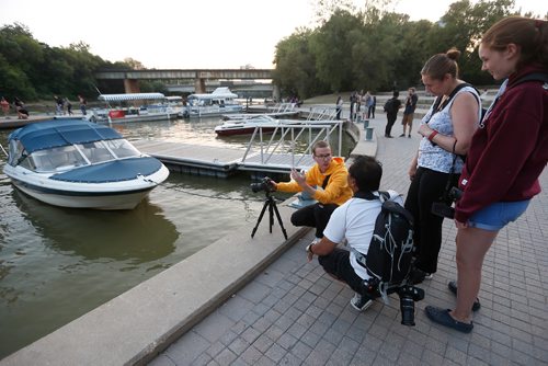 JOHN WOODS / WINNIPEG FREE PRESS
Joseph Visser talks to participants in a From Here and Away nighttime photo excursion as part of Summertide at The Forks in Winnipeg Tuesday, August 22, 2017.