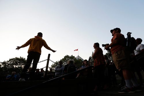 JOHN WOODS / WINNIPEG FREE PRESS
Joseph Visser talks to participants in a From Here and Away nighttime photo excursion as part of Summertide at The Forks in Winnipeg Tuesday, August 22, 2017.