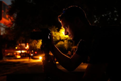 JOHN WOODS / WINNIPEG FREE PRESS
Kris Innes participates in a From Here and Away nighttime photo excursion as part of Summertide at The Forks in Winnipeg Tuesday, August 22, 2017.