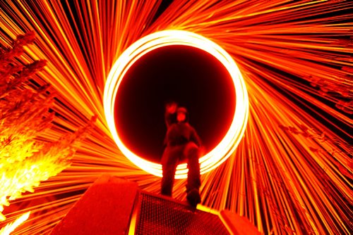 JOHN WOODS / WINNIPEG FREE PRESS
Travis Milkowski puts on a light show at a From Here and Away nighttime photo excursion as part of Summertide at The Forks in Winnipeg Tuesday, August 22, 2017.