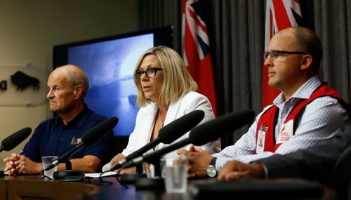 WAYNE GLOWACKI / WINNIPEG FREE PRESS

Sustainable Development Minister Rochelle Squires with at left Gary Friesen, manager, fire program, Manitoba Sustainable Development and Shawn Feely, vice president for Manitoba and Nunavut, Canadian Red Cross at the news conference in the Legislative building Wednesday to update wildfire response efforts in Island Lake area. Nick Martin story  August 30 2017