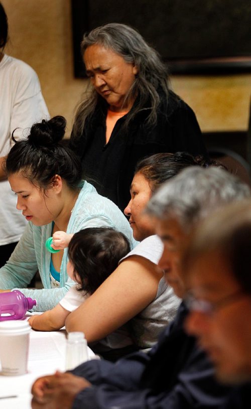 PHIL HOSSACK / WINNIPEG FREE PRESS  -  The very young and the old from Garden Hill Mb. wait in line at a Red Cross reception area for refugees fleeing norther fires in Manitoba Wednesday. See story - August 30, 2017