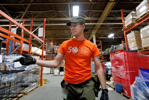 JUSTIN SAMANSKI-LANGILLE / WINNIPEG FREE PRESS
Hugh Campbell gives the Free Press a tour Wednesday of the warehouse containing all of the surplus equipment from the Canada Games. Many of the items are being auctioned off and the rest are being shipped off to Alberta to be re-used for the next games.
170830 - Wednesday, August 30, 2017.