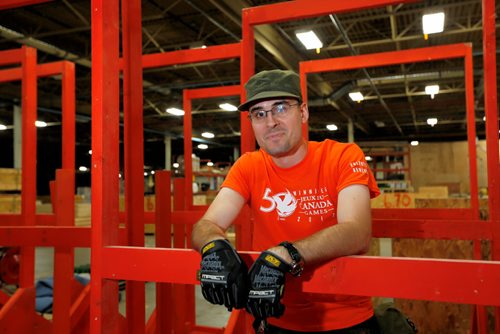 JUSTIN SAMANSKI-LANGILLE / WINNIPEG FREE PRESS
Hugh Campbell poses Wednesday in the warehouse containing all of the surplus equipment from the Canada Games. Many of the items are being auctioned off and the rest are being shipped off to Alberta to be re-used for the next games.
170830 - Wednesday, August 30, 2017.