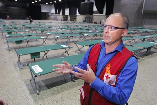 BORIS MINKEVICH / WINNIPEG FREE PRESS
Shawn Feely, vice president of the Canadian Red Cross for the Manitoba and Nunavut regions in front of cots in the RBC Convention Centre. The first bus loads of forest fire evacuees from Garden Hill northern MB arrived at the RBC Convention Centre this morning. BEN WALDMAN STORY. August 31, 2017