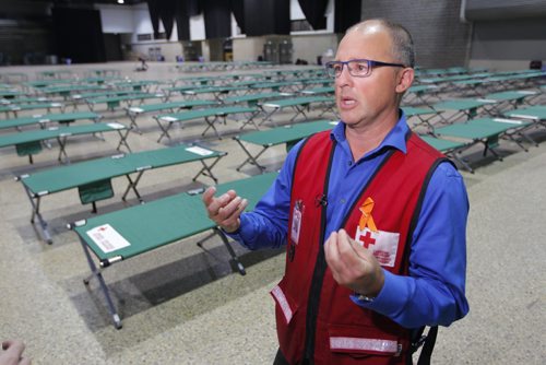 BORIS MINKEVICH / WINNIPEG FREE PRESS
Shawn Feely, vice president of the Canadian Red Cross for the Manitoba and Nunavut regions in front of cots in the RBC Convention Centre. The first bus loads of forest fire evacuees from Garden Hill northern MB arrived at the RBC Convention Centre this morning. BEN WALDMAN STORY. August 31, 2017