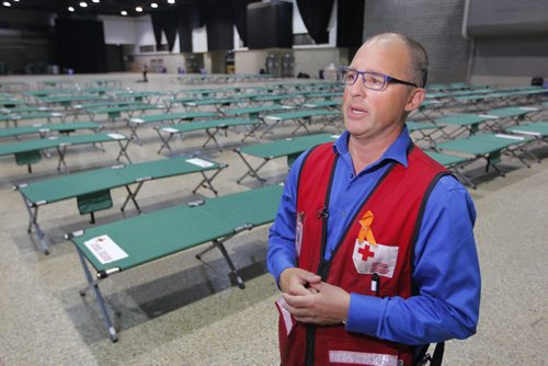 BORIS MINKEVICH / WINNIPEG FREE PRESS
Shawn Feely, vice president of the Canadian Red Cross for the Manitoba and Nunavut regions in front of cots in the RBC Convention Centre. The first bus loads of forest fire evacuees from Garden Hill northern MB arrived at the RBC Convention Centre this morning. BEN WALDMAN STORY. August 31, 2017