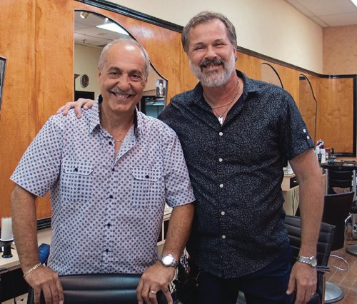 Canstar Community News (From left) Tony Perrelli, owner of Hair Network in McIvor Mall, and longtime employee Dale King, who has been with Hair Network for 29 years. (SHELDON BIRNIE/CANSTAR/THE HERALD)