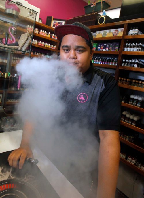 BORIS MINKEVICH / WINNIPEG FREE PRESS
The Province of Manitoba is banning the sale of vape to minors, use indoors and in public settings. Photo taken of Flamingo vape shop manager Mike C showing what vaping is in the store on north Main Street. Sept. 6, 2017