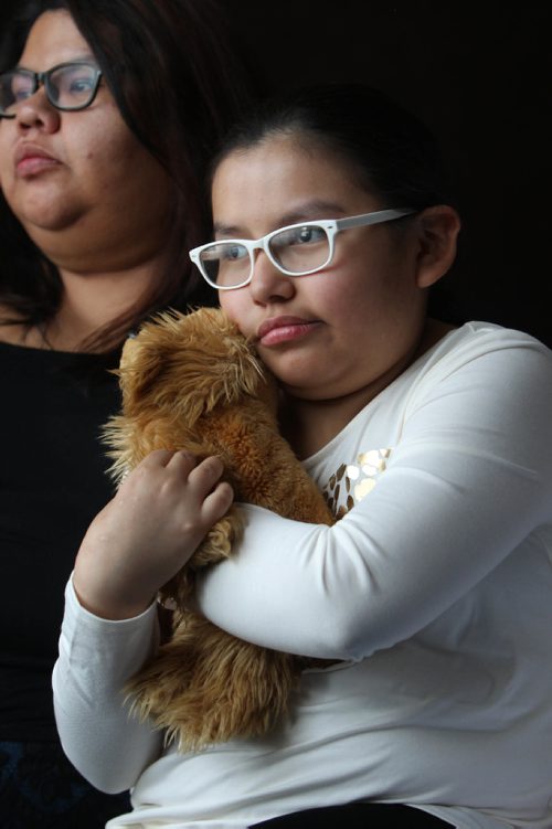 RUTH BONNEVILLE / WINNIPEG FREE PRESS 

Ten-year-old Kiearra Wood with her mom Maralee Wood next to her, holds her stuffed dog that she brought with her from her home in the  remote, northern community of Wasagamack after wild fires in the area threatened their community ten days ago.  Kiearra took footage of the scene which she describes as a smokey, orange hue which was cast on them from flames and black smoke nearby.while waiting for boats to take them to St. Theresa Point and then airlifted to Winnipeg and surrounding communities.  The two are staying in a hotel that a family member provided but other evacuees from the community and surrounding areas (6,000 in total) were put up in makeshift community halls for a number of days before  the Red Cross and community leaders could place them in hotels until they can return to their community.  
Note: I saw the video footage she took which does have a orange hue and asked her mom to send it to us.  
See Alex Paul story.


Sept  06, 2017
