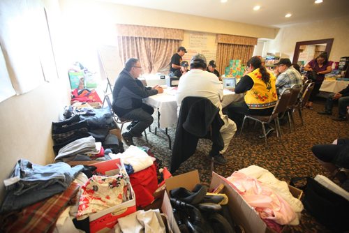RUTH BONNEVILLE / WINNIPEG FREE PRESS 

Community members of remote, northern community of Wasagamack  along with their  Chief Alex McDougal  (far left in blue plaid shirt), work at makeshift command centre set up on the 4th floor of the Best Western Hotel to help the evacuees. 
Note: photos of the fires and community being evacuated being sent to reporter and photo desk.  
See Alex Paul story.


Sept  06, 2017

