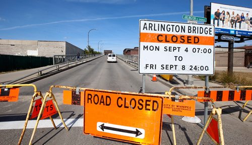 WAYNE GLOWACKI / WINNIPEG FREE PRESS

The Arlington Bridge was closed this week to shoot a movie scene. On Thursday afternoon there was no movie activity, just vehicles parked on the bridge. Pedestrians and cyclists were using the sidewalk to cross. The bridge reopens to traffic on Friday Sept.8 at midnight.   Sept. 7 2017