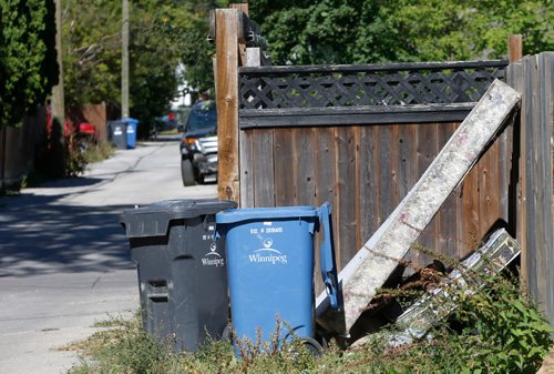 WAYNE GLOWACKI / WINNIPEG FREE PRESS

Mattresses in the back lane in the Mountain Ave. Salter St. area.  Sept. 8 2017