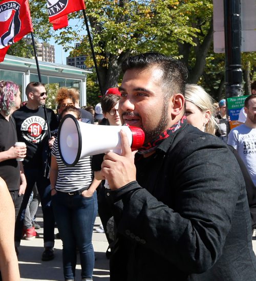 WAYNE GLOWACKI / WINNIPEG FREE PRESS

Over two hundred anti-fascist demonstrators including Omar Kinnarath on Portage Ave. in front of the CBC Saturday morning. They later marched to the Legislative grounds to join the Winnipeg Diversity Rally Against Hate demonstration.  Ryan Thorpe  story Sept. 9 2017