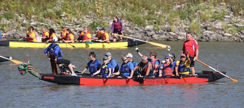 JASON HALSTEAD / WINNIPEG FREE PRESS

Members of the Prostate Paddlers team take part in the flower ceremony at the Canadian Cancer Society September Dragon Boat Challenge on Sept. 9, 2017 at the Manitoba Canoe & Kayak Centre. The flower ceremony involves flowers being placed in the water to honour those living with or taken by cancer. (See Social Page)