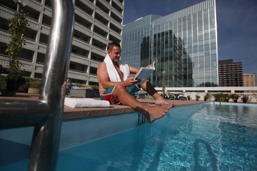 RUTH BONNEVILLE / WINNIPEG FREE PRESS

Standup Feature:  
John Millner enjoys some down time in the warm sun at the Delta Marriott Hotels Blu Pool and Terrace, Winnipeg's only rooftop outdoor pool, while in Winnipeg on a business trip Monday.  


SEPT 11, 2017
