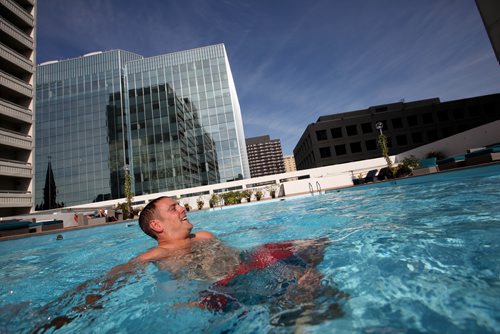 RUTH BONNEVILLE / WINNIPEG FREE PRESS

Standup Feature:  
John Millner enjoys some down time in the warm sun at the Delta Marriott Hotels Blu Pool and Terrace, Winnipeg's only rooftop outdoor pool, while in Winnipeg on a business trip Monday.  


SEPT 11, 2017
