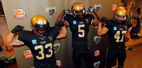 BORIS MINKEVICH / WINNIPEG FREE PRESS
Bison Sports presser in the Bison football dressing room at IGF. Bison Football unveiled their new jerseys. They are the first new uniforms for the program since the 2008 season. From left, #33 Alex Christie, #5 Akeeno Williams, #47 James Mau. Sept. 12, 2017