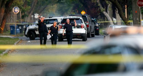 WAYNE GLOWACKI / WINNIPEG FREE PRESS

Winnipeg Police on a taped off section of Alfred Ave. between Andrews St. and Salter St. Wednesday morning after a serious incident. Carol Sanders story  Sept. 13 2017