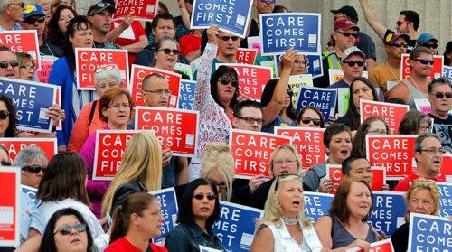 BORIS MINKEVICH / WINNIPEG FREE PRESS
Healthcare cuts protest on the steps of the leg. Care comes first.  Sept. 13, 2017