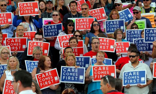 BORIS MINKEVICH / WINNIPEG FREE PRESS
Healthcare cuts protest on the steps of the leg. Care comes first.  Sept. 13, 2017