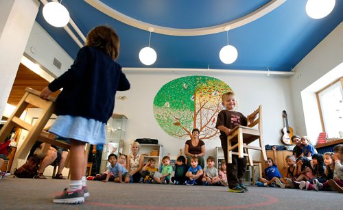 WAYNE GLOWACKI / WINNIPEG FREE PRESS
In center, Caroline Le Nabat with students at the Childrens House Montessori School on Pacific Ave. Children are being taught the proper way to move a chair. This is the first Montessori School in Winnipeg, and it is turning 50 and celebrating with a street party on Sun, Sept. 24. Bill Redekop story Sept. 13 2017