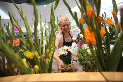 RUTH BONNEVILLE / WINNIPEG FREE PRESS


Sunday Special; Feature on  Portage Place turning 30.
Melanie Bernadsky is part owner of Freshcut Flowers with her sister Monica at which is situated near centre court or Kennedy court at  Portage Place.
 When the mall opened in 1987, it was to great fanfare and hopes it would "be the first step toward (downtown) revitalization and that, with a strong commercial core and residential development, other facilities would soon follow,"  Now, 30 years later  operating with many shuttered storefronts and having dealt with big-name closures (McNally, Holt Renfrew, IMAX),complaints of drug deals happening on the premises and increased retail competition, can Portage Place bounce back? Does it have plans to?
See Jessica Botelho-Urbanski story. 

SEPT 13, 2017
