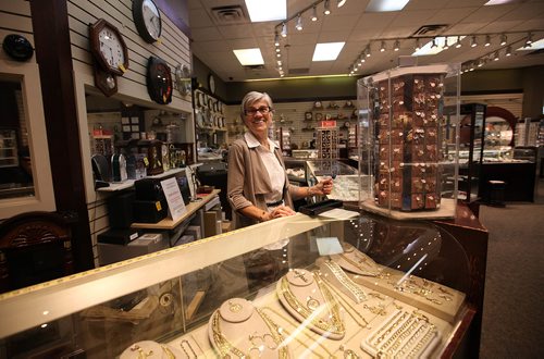 RUTH BONNEVILLE / WINNIPEG FREE PRESS


Sunday Special; Feature on  Portage Place turning 30.
City Jewellers owner Jacqueline Curpen.  Jacqueline and her husband who own City Jewellers have been tenants of Portage Place for many years.  
 When the mall opened in 1987, it was to great fanfare and hopes it would "be the first step toward (downtown) revitalization and that, with a strong commercial core and residential development, other facilities would soon follow,"  Now, 30 years later  operating with many shuttered storefronts and having dealt with big-name closures (McNally, Holt Renfrew, IMAX),complaints of drug deals happening on the premises and increased retail competition, can Portage Place bounce back? Does it have plans to?

See Jessica Botelho-Urbanski story. 

SEPT 13, 2017
