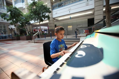 RUTH BONNEVILLE / WINNIPEG FREE PRESS


Sunday Special; Feature on  Portage Place turning 30. 
Eight-year-old Malkin Clippin plays on the piano in Kennedy Court or Centre Court of Portage Place while his mother keeps an eye on him Wednesday.  
When the mall opened in 1987, it was to great fanfare and hopes it would "be the first step toward (downtown) revitalization and that, with a strong commercial core and residential development, other facilities would soon follow,"  Now, 30 years later  operating with many shuttered storefronts and having dealt with big-name closures (McNally, Holt Renfrew, IMAX),complaints of drug deals happening on the premises and increased retail competition, can Portage Place bounce back? Does it have plans to?

See Jessica Botelho-Urbanski story. 

SEPT 13, 2017
