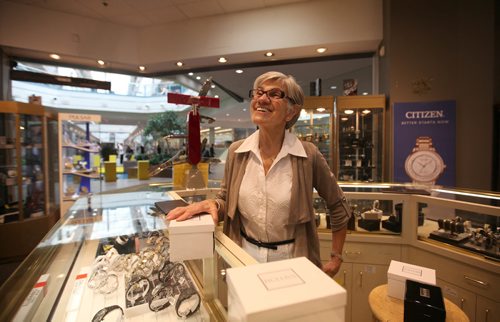 RUTH BONNEVILLE / WINNIPEG FREE PRESS


Sunday Special; Feature on  Portage Place turning 30.
City Jewellers owner Jacqueline Curpen.  Jacqueline and her husband who own City Jewellers have been tenants of Portage Place for many years.  
 When the mall opened in 1987, it was to great fanfare and hopes it would "be the first step toward (downtown) revitalization and that, with a strong commercial core and residential development, other facilities would soon follow,"  Now, 30 years later  operating with many shuttered storefronts and having dealt with big-name closures (McNally, Holt Renfrew, IMAX),complaints of drug deals happening on the premises and increased retail competition, can Portage Place bounce back? Does it have plans to?

See Jessica Botelho-Urbanski story. 
SEPT 13, 2017
