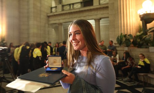 RUTH BONNEVILLE / WINNIPEG FREE PRESS

Sandra Page a Canoe Kayak medalist  (IC-4 - 200m female) shows off her medal and Order of The Buffalo Hunt certificates given to her by the City of Winnipeg at the Manitoba Legislative Building at a reception for Canada Summer Games medalists Thursday evening.  

Premier Brian Pallister and Mayor Brian Bowman congratulated all the medalists at the opening of the event before awards were handed out.  

SEPT 14, 2017

