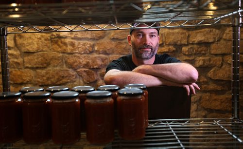 RUTH BONNEVILLE / WINNIPEG FREE PRESS

Chefs Table;  portrait shot of chef Ben Kramer with a rack of his freshly made tomato preserves taken at Kitchen Sync for the Uptown Chefs Table feature.

Jill Wilson story.  

SEPT 15, 2017
