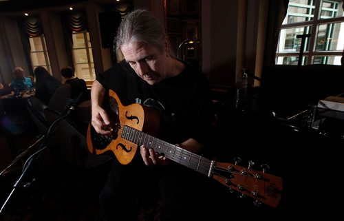 PHIL HOSSACK / WINNIPEG FREE PRESS - Laurie MacKenzie warms up while setting up for a gig at the Fort Garry Hotel's Palm Room Friday. See Sanderson story.  - September 15, 2017