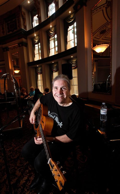 PHIL HOSSACK / WINNIPEG FREE PRESS - Laurie MacKenzie warms up while setting up for a gig at the Fort Garry Hotel's Palm Room Friday. See Sanderson story.  - September 15, 2017