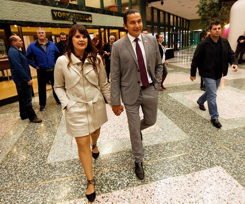 PHIL HOSSACK / WINNIPEG FREE PRESS - Wab Kinew and his wife Lisa Monkman (left)  arrive at the Convention Centre Friday evening for the opening banquet at the NDP convention.....See story.   - September 15, 2017