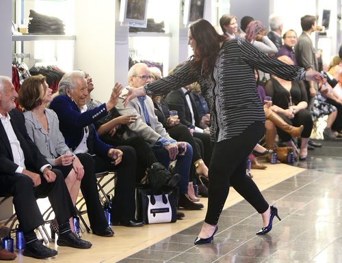 JASON HALSTEAD / WINNIPEG FREE PRESS

A model on the runway has some fun with Peter Nygard on Sept. 15, 2017 at the Nygard Fashion Show in support of Breast Cancer Research and to preview the companys new fall fashions at the Nygard Fashion Park store on Kenaston Boulevard. All ticket proceeds will be donated to CancerCare Manitoba. (See Social Page)