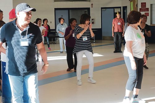 Canstar Community News Sept. 11, 2017 - Tyndall Park seniors practice line dancing at the first Tyndall Park Community Centre Exercise 55+ Program. (LIGIA BRAIDOTTI/CANSTAR COMMUNITY NEWS/TIMES)