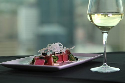 RUTH BONNEVILLE / WINNIPEG FREE PRESS

Restaurant Review:  Skyline views from Winnipeg's Revolving Restaurant, Prairie 360 with Huan Tuna Carpaecio Piquant dish created by  Chef Huan Nguyen.

 
SEPT 18, 2017
