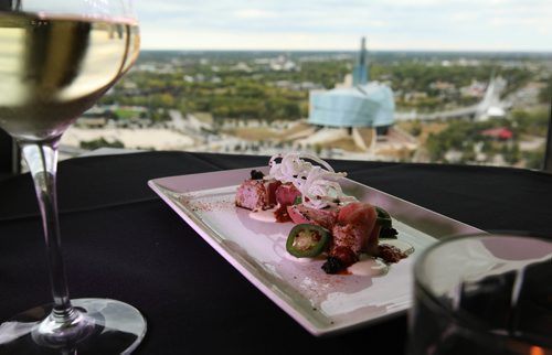 RUTH BONNEVILLE / WINNIPEG FREE PRESS

Restaurant Review:  Skyline views from Winnipeg's Revolving Restaurant, Prairie 360 with Huan Tuna Carpaecio Piquant dish created by  Chef Huan Nguyen.

 
SEPT 18, 2017
