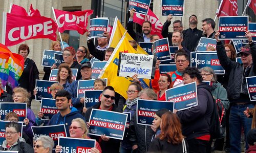 BORIS MINKEVICH / WINNIPEG FREE PRESS
Make Poverty History Manitoba and the Manitoba Federation of Labour are hosted a community rally calling on the Government of Manitoba to make the minimum wage a living wage at $15-an-hour on the steps of the Leg today. Sept. 19, 2017