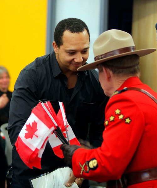 BORIS MINKEVICH / WINNIPEG FREE PRESS
Andrew Scott, from Jamaica, became a Canadian Citizen today at a special citizenship ceremony held at the Winnipeg Police Service Headquarters as part of Canada 150. Sept. 19, 2017