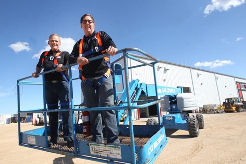 JOE BRYKSA / WINNIPEG FREE PRESSEd Dwyer- President of C&T Rentals, left, with his safety manager Alain Houle on a lift rental- C&T Rentals is  Manitobas largest independently- owned rental company in their new location at 52 South Landing off of McGillivray. Sept 20, 2017 -( See Murrays biz 49.8  story)