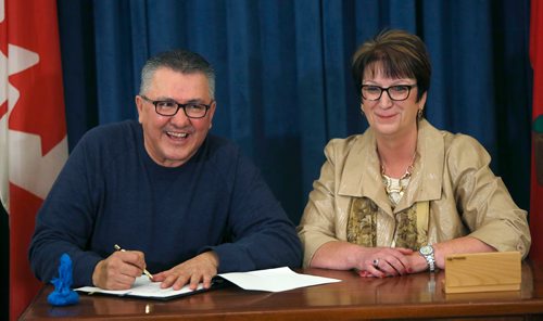 WAYNE GLOWACKI / WINNIPEG FREE PRESS

Chief Tony Powderhorn, Sayisi Dene First Nation and Eileen Clarke, Indigenous and Northern Relations Minister at the signing ceremony in the Manitoba Legislative building Wednesday. The Manitoba government will be entering into a bilateral provincial Relocation Claim Lands Agreement with the Sayisi Dene First Nation. According to the news release  the bilateral Relocation Claim Lands Agreement will provide 13,054 acres of Crown land at Little Duck Lake to Indigenous and Northern Affairs Canada (INAC) to address the forced relocation of the Sayisi Dene people from their traditional territory.¤ The Crown land will be converted to reserve by INAC and is separate from any treaty land entitlements. Sept. 20 2017