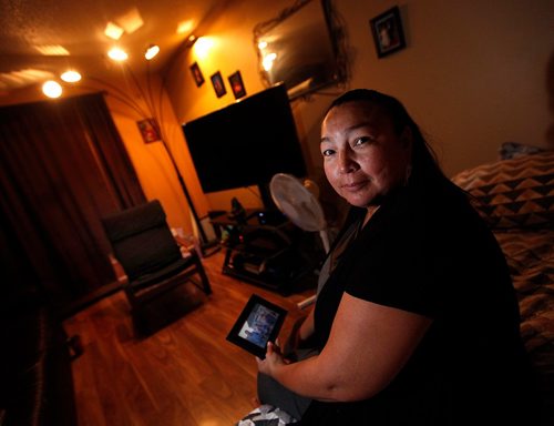 PHIL HOSSACK / WINNIPEG FREE PRESS  -  Betsy Mayham holds a photo of her brother Wednesday night. See Melissa Martin's story re: healing from suicide. Betsey talked about ways she coped with and continues to cope after her brother's suicide in 2006.  - Sept 20 2017