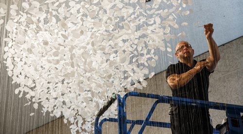 MIKE DEAL / WINNIPEG FREE PRESS
Vitaliy Yatsevych a conservator at the WAG makes some final adjustments to a piece by Hannah Claus, cloudscape, 2012 (double-matte reprography film, thread, PVA glue), one of the works of art by twenty-nine Indigenous artists for the Insurgence/Resurgence show at the Winnipeg Art Gallery.
170921 - Thursday, September 21, 2017.