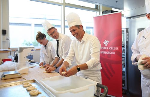 RUTH BONNEVILLE / WINNIPEG FREE PRESS

Winnipeg Mayor Brian Bowman has some fun during bake-off with RRC CEO Paul Vogt  in fun event to celebrate the five-year anniversary of the Paterson GlobalFoods Institute Friday.  Suzanne Gessler (rear)  with Pennyloaf Bakery and a past grad of the professional baking program, also takes part in the bake-off.
 


SEPT 22, 2017