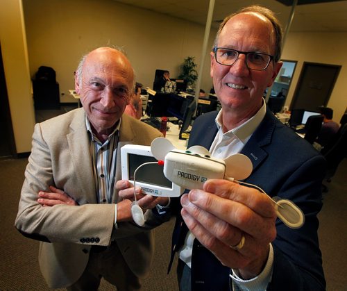 PHIL HOSSACK / WINNIPEG FREE PRESS  -  Earl Gardiner (right)  is CEO of a sleep technology company called Cerebra Health that is innovating a new way to analyze and diagnose sleep disorders that goes way beyond sleep apnea. The company uses technology (the portable testing sensor and monitor held in the photo) developed by noted Manitoba scientist, Magdy Younes (left).  The company just raised significant money to allow it enter the market.  Martin Cash story. - September 25, 2017