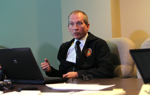 RUTH BONNEVILLE / WINNIPEG FREE PRESS

49.8 Interviews with top Winnipeg Fire Paramedic Service Chief and Deputy Chief at King street office for a 49.8 piece focusing on the use of fire and paramedic resources in Winnipeg and how well (or not) the integrated system is working. 
Photo of  Chief John Lane answering questions from reporter in boardroom.  
See Larry Kusch story. 
SEPT 29, 2017