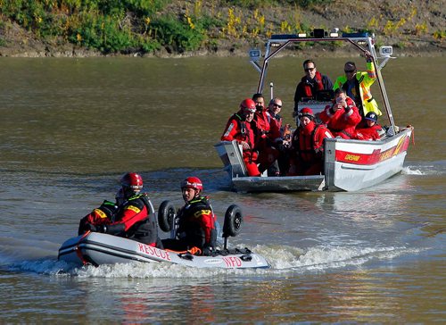 BORIS MINKEVICH / WINNIPEG FREE PRESS
 Winnipeg Fire Paramedic Service water rescue team launched their two new water rescue units at a press event at St. Vital Park boat launch. Various photos of the training event that took place at the launch. Sept. 30, 2017